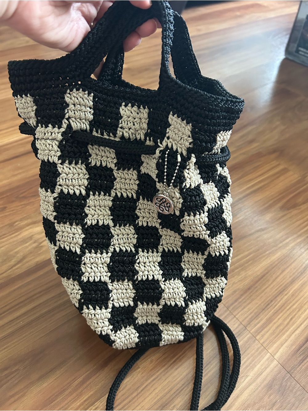 The Sak Checkered Bucket Backpack